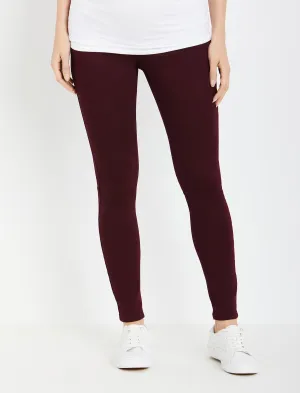 The Bella Secret Fit Belly 5-Pocket Skinny Leg Maternity Pants in Wine Tasting