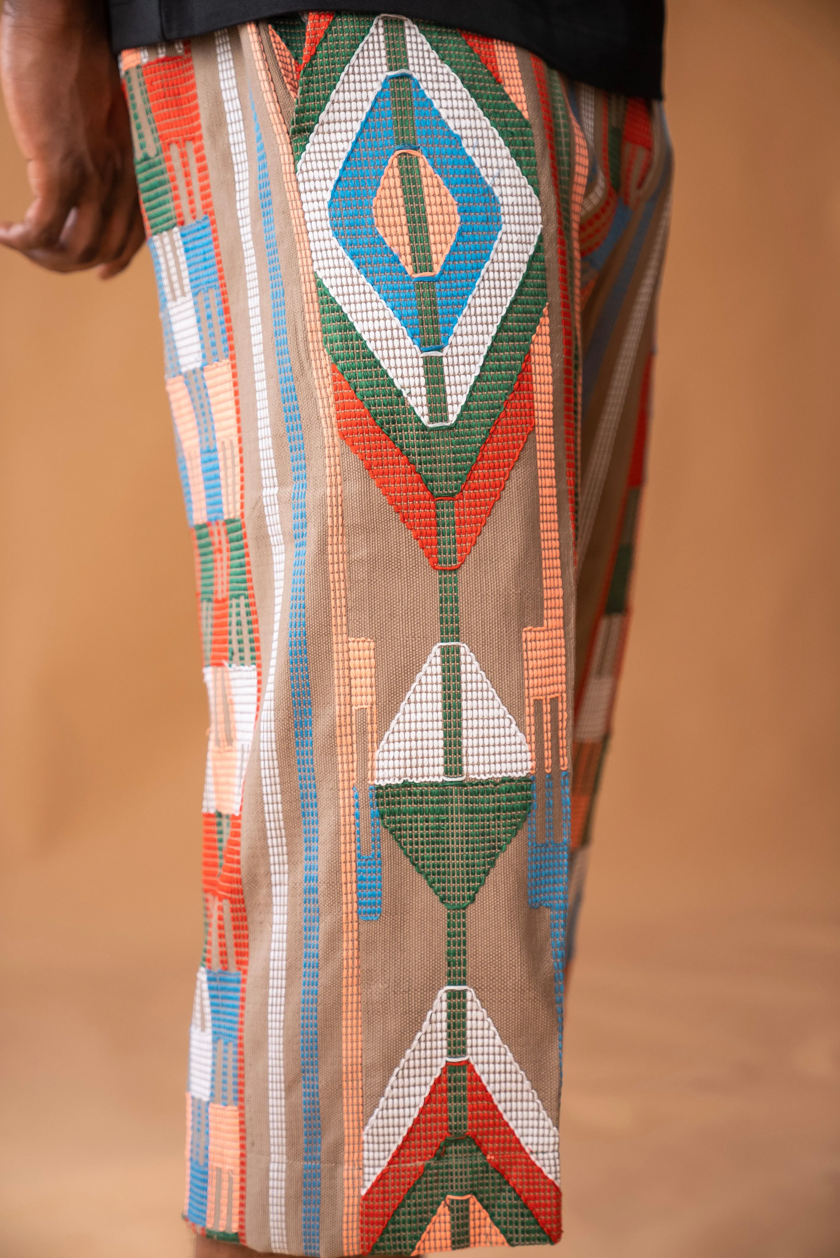 Wide-leg trousers in Aso oke and Akwete