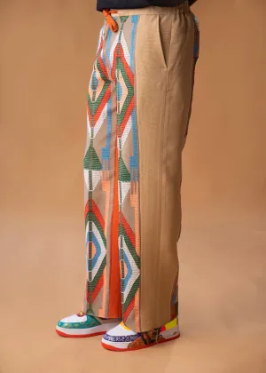 Wide-leg trousers in Aso oke and Akwete